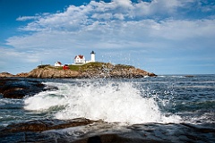 Waves Crashing on Rocks by Nubble Lighthouse in Maine